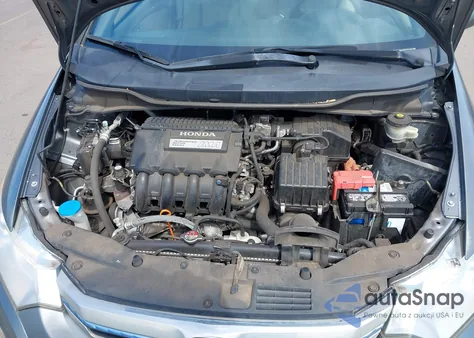 2014 Honda Insight from USA, damaged, VIN JHMZE2H37ES001644